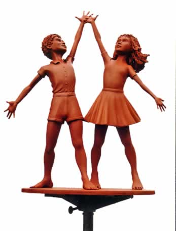 Sculpture of boy & girl
